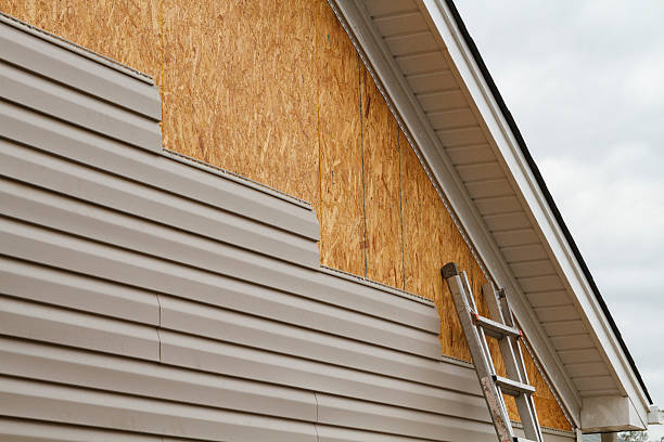 Professional Storm Damage Siding Repair technician working in Clear Spring, MD
